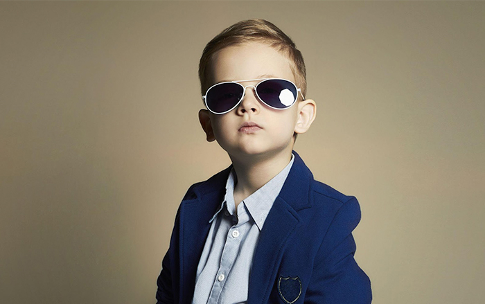 Boy wearing cool white aviator sunglasses